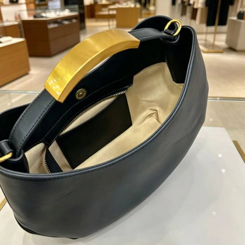 Halvemaanvormige dames handtas - Tote Bag Beach recensie en prijs